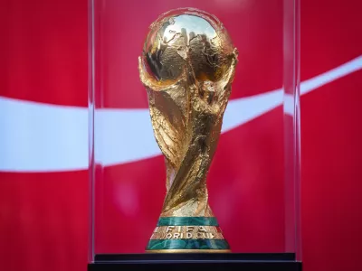 The FIFA World Cup trophy is displayed during the launch of a trophy tour in Vancouver, on Friday, April 10, 2026. (Darryl Dyck/The Canadian Press via AP)