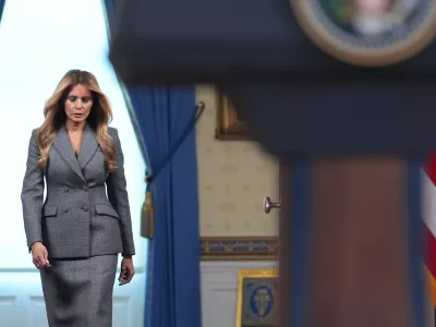 First lady Melania Trump arrives to speak with reporters Thursday, April 9, 2026, in the Grand Foyer of the White House in Washington. (AP Photo/Jacquelyn Martin)