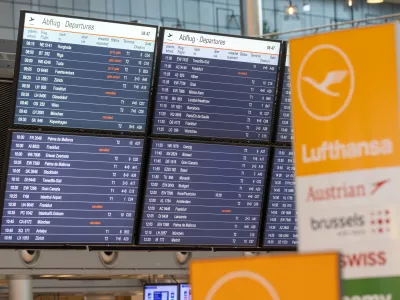 Canceled flights are shown on a display board at the airport in Hamburg, Germany, Friday, April 10, 2026. (Bodo Marks/dpa via AP)