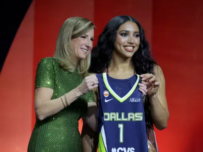 Apr 13, 2026; New York, NY, USA; WNBA Commissioner Cathy Engelbert (left) poses for photos with Azzi Fudd who was selected first overall by the Dallas Wings during the 2026 WNBA Draft at The Shed at Hudson Yards. Mandatory Credit: Brad Penner-Imagn Images