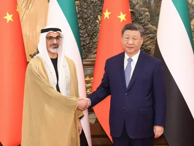 China's President Xi Jinping shakes hands with Sheikh Khaled bin Mohamed bin Zayed Al Nahyan, Crown Prince of Abu Dhabi, United Arab Emirates, in Beijing, China, April 14, 2026. cnsphoto via REUTERS ATTENTION EDITORS - THIS IMAGE WAS PROVIDED BY A THIRD PARTY. CHINA OUT. NO COMMERCIAL OR EDITORIAL SALES IN CHINA