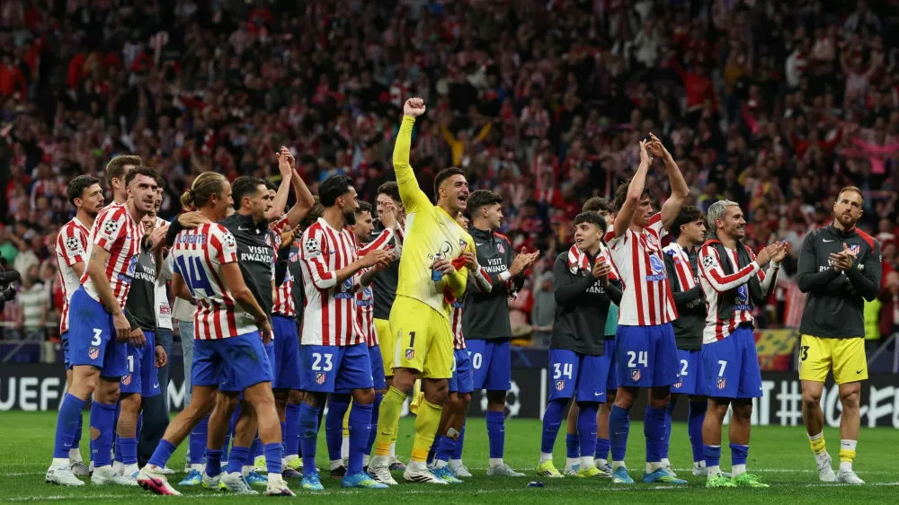 Soccer Football - UEFA Champions League - Quarter Final - Second Leg - Atletico Madrid v FC Barcelona - Riyadh Air Metropolitano, Madrid, Spain - April 14, 2026 Atletico Madrid players celebrate after the match REUTERS/Gonzalo Fuentes