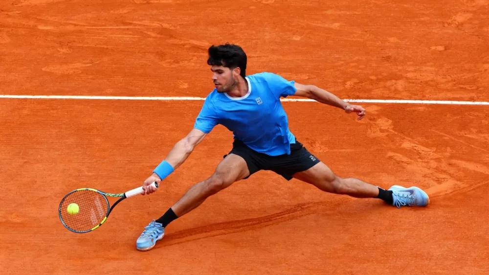 Tennis - ATP Masters 1000 - Monte Carlo Masters - Monte Carlo Country Club, Roquebrune-Cap-Martin, France - April 12, 2026 Spain's Carlos Alcaraz in action during his final match against Italy's Jannik Sinner REUTERS/Manon Cruz
