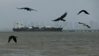 FILE PHOTO: Birds fly near the Jag Vasant vessel transferring LPG at a port after transiting the Strait of Hormuz amid supply disruptions linked to the U.S-Israeli conflict with Iran, in Mumbai, India, April 1, 2026. REUTERS/Francis Mascarenhas/File Photo
