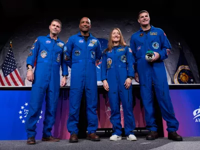 NASA's Artemis II crew - NASA astronauts Reid Wiseman, Victor Glover, and Christina Koch, and Canadian Space Agency (CSA) astronaut Jeremy Hansen pose for a photo during a press conference on Thursday, April 16, 2026, in Houston. (AP Photo/Ashley Landis)