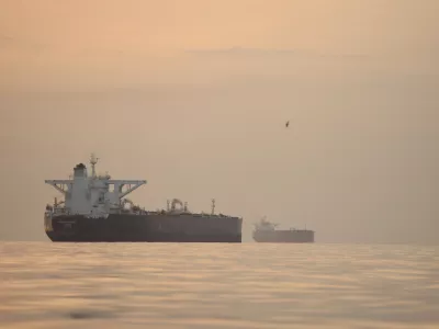 Tankers anchored in the Strait of Hormuz off the coast of Qeshm Island, Iran, Saturday, April 18, 2026. (AP Photo/Asghar Besharati)