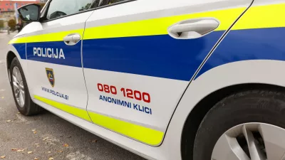 Kranj, Slovenia - October 21, 2022: Slovenian police patrol car parked in front of the police station in Kranje.. Police car with the lettering "Policija".