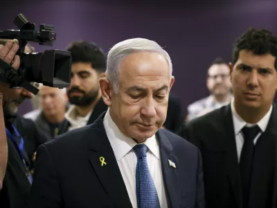 FILE - Israeli Prime Minister Benjamin Netanyahu attends his trial where he faces corruption charges at the district court in Tel Aviv, Israel, Dec. 16, 2024. (Stoyan Nenov/Pool Photo via AP, File)
