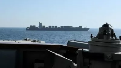 A view of Iranian-flagged cargo ship M/V Touska as the U.S. Navy Arleigh Burke-class Aegis guided missile destroyer USS Spruance conducts its interception in a location given as the north Arabian Sea, in this screen capture from a video released April 19, 2026. CENTCOM/Handout via REUTERS  THIS IMAGE HAS BEEN SUPPLIED BY A THIRD PARTY. THIS IMAGE WAS PROCESSED BY REUTERS TO ENHANCE QUALITY, AN UNPROCESSED VERSION HAS BEEN PROVIDED SEPARATELY. VERIFICATION -Identity of the ship confirmed as Touska by shape which matched file imagery of the vessel. -Exact date not verified but no older version found posted online before April 19. -Vessel tracking data showed the most recent location of Touska near the Gulf of Oman on April 19.