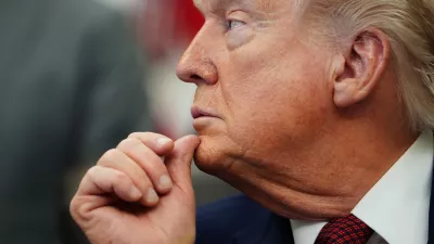 President Donald Trump listens to speeches before signing an executive order in the Oval Office of the White House, Saturday, April 18, 2026, in Washington. (AP Photo/Julia Demaree Nikhinson)