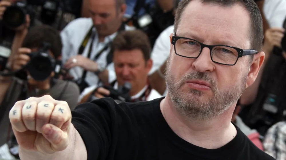 Director Lars Von Trier poses during a photocall for the film "Melancholia", in competition at the 64th Cannes Film Festival, May 18, 2011. Von Trier was expelled from the Cannes film festival on Thursday after remarks he made at a news conference, apparently in jest, in which he declared himself a Nazi and Hitler sympathiser. Picture taken May 18, 2011. REUTERS/Eric Gaillard (FRANCE - Tags: ENTERTAINMENT) TEMPLATE OUT. SENSITIVE MATERIAL. THIS IMAGE MAY OFFEND OR DISTURB