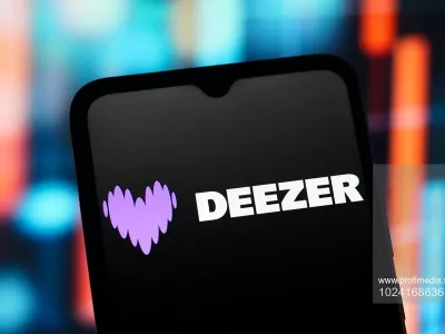 In this photo illustration, the Deezer logo is seen displayed on a smartphone screen.,Fotografija:1024168636, Licenca:Rights-managed, Omejitve:*** World Rights *** Strictly for editorial news purposes only ***, Model izdaje:no