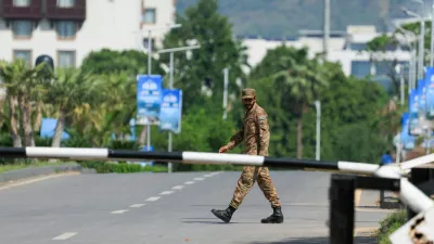 A Pakistani army soldier walks on the premises of the Serena Hotel, as Pakistan prepares to host the U.S. and Iran for the second phase of peace talks in Islamabad, Pakistan, April 21, 2026. REUTERS/Akhtar Soomro