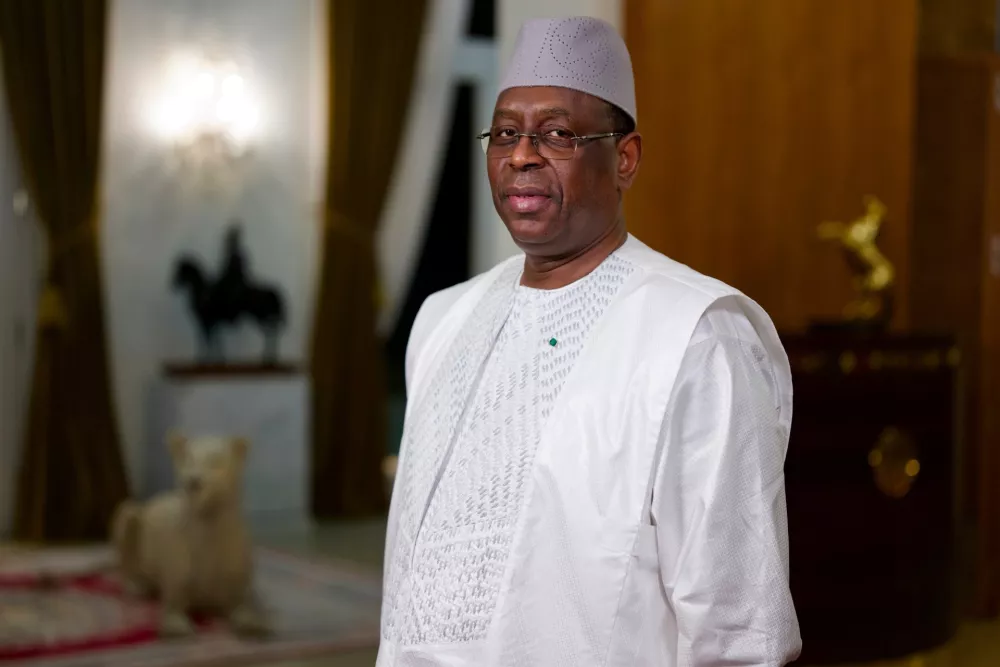 FILE - Senegal President Macky Sall poses before an interview with The Associated Press at the presidential palace in Dakar, Senegal, Feb. 9, 2024. (AP Photo/Sylvain Cherkaoui, File)