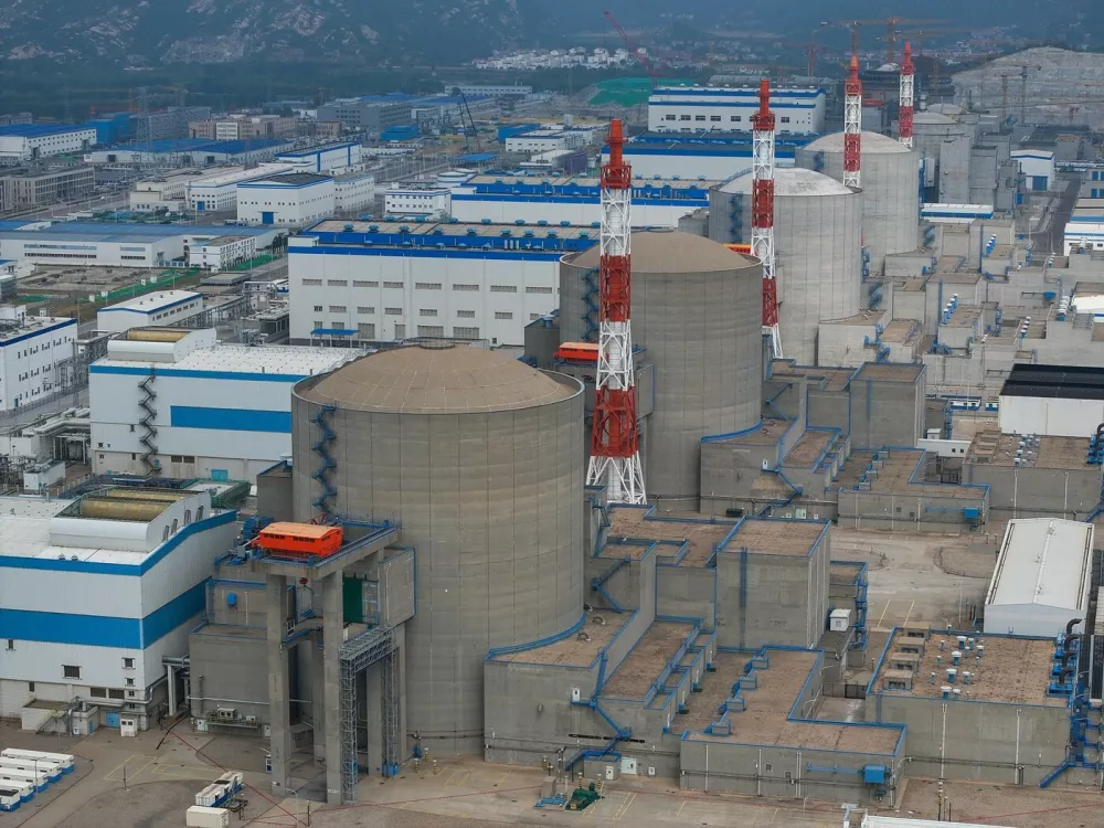 NANJING, June 19, 2024 -- An aerial drone photo taken on June 19, 2024 shows a view of the Tianwan Nuclear Power Station in Lianyungang City, east China's Jiangsu Province. China has successfully completed a project aimed at transporting steam generated by a nuclear power station to a petrochemical base. The project is designed to help reduce carbon emissions and explore collaborative energy utilization in nuclear and traditional industries. TO GO WITH "China Focus: China explores applications of nuclear energy in reducing carbon emissions in petrochemical industry",Image: 883023554, License: Rights-managed, Restrictions:, Model Release: no
