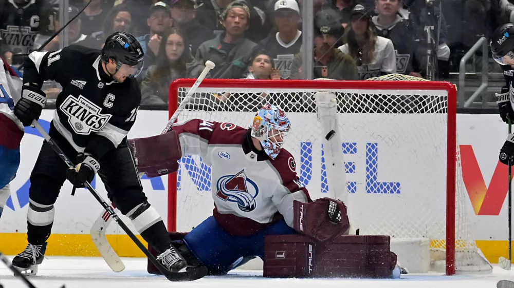 Apr 23, 2026; Los Angeles, California, USA; Los Angeles Kings center Anze Kopitar (11) looks on as the puck gets past Colorado Avalanche goaltender Scott Wedgewood (41) for a goal by Los Angeles Kings right wing Adrian Kempe (9) during the third period of game three of the first round of the 2026 Stanley Cup Playoffs at Crypto.com Arena. Mandatory Credit: Jayne Kamin-Oncea-Imagn Images