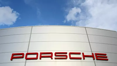 FILE PHOTO: A logo of Porsche is seen outside a Porsche car dealer in Brussels, Belgium March 13, 2023. REUTERS/Yves Herman/File Photo/File Photo