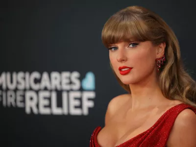 FILE PHOTO: Taylor Swift poses at the red carpet during the 67th Annual Grammy Awards in Los Angeles, California, U.S., February 2, 2025. REUTERS/Daniel Cole/File Photo