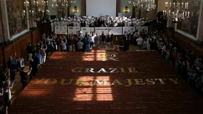 Chefs and volunteers celebrate after breaking the Guinness World Record for the longest tiramisu, which measured 400 metres, in London, Britain, April 26, 2026. REUTERS/Carlos Jasso