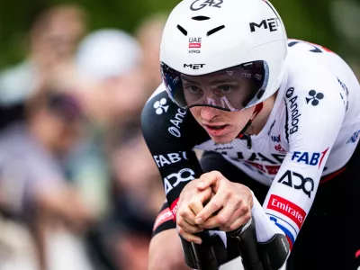 Tadej Pogacar from Slovenia of UAE Team Emirates XRG in action during the prologue, a 3,2 km race against the clock at the 79th Tour de Romandie UCI World Tour Cycling race, in Villars-sur-Glane, Switzerland, Tuesday, April 28, 2026. (Laurent Gillieron/Keystone via AP)
