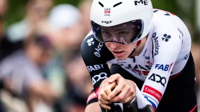 Tadej Pogacar from Slovenia of UAE Team Emirates XRG in action during the prologue, a 3,2 km race against the clock at the 79th Tour de Romandie UCI World Tour Cycling race, in Villars-sur-Glane, Switzerland, Tuesday, April 28, 2026. (Laurent Gillieron/Keystone via AP)