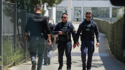 Police officers walk outside the Athens' Court of Appeal following a shooting incident that left several wounded, in Athens, Greece, April 28, 2026. Sotiris Dimitropoulos/Eurokinissi via REUTERS THIS IMAGE HAS BEEN PROVIDED BY A THIRD PARTY. NO RESALES. NO ARCHIVES. MANDATORY CREDIT. GREECE OUT. NO COMMERCIAL OR EDITORIAL SALES IN GREECE.