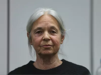 Daniela Klette, accused of being one of the last surviving members of the Red Army Faction group, who was arrested after decades on the run for armed robbery and attempted murder, reacts on the day of her trial at a regional court in Celle, Germany March 25, 2025. REUTERS/Wolfgang Rattay