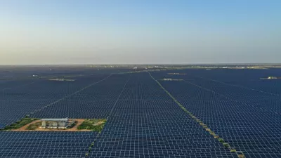 This photo taken on October 6, 2021 shows solar panels at the site of solar energy projects developer Saurya Urja Company of Rajasthan Limited, at the Bhadla Solar Park in Bhadla, in the northern Indian state of Rajasthan. Currently, coal powers 70 percent of the nation's electricity generation, but Indian Prime Minister Narendra Modi pledged on November 1 that it would produce more energy than India's entire grid now through solar and other renewables by 2030.,Image: 640990689, License: Rights-managed, Restrictions: TO GO WITH Climate-UN-COP26-energy-solar,FEATURE by Glenda KWEK, Model Release: no 