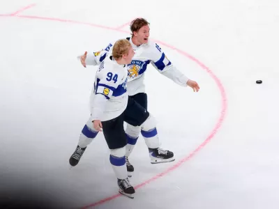 Ice Hockey - IIHF World Championships - Gold Medal Game - Switzerland v Finland - Swiss Life Arena, Zurich, Switzerland - May 31, 2026 Finland's Konsta Helenius celebrates scoring their first goal in overtime with Anton Lundell REUTERS/Denis Balibouse