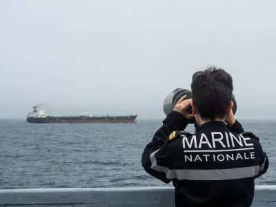 A French Navy personnel observes an oil tanker, subject to international sanctions and sailing from Russia, sailing in the Atlantic Ocean, in this handout obtained by Reuters on June 1, 2026. Marine Nationale/Handout via REUTERS  THIS IMAGE HAS BEEN SUPPLIED BY A THIRD PARTY. NO RESALES. NO ARCHIVES