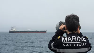 A French Navy personnel observes an oil tanker, subject to international sanctions and sailing from Russia, sailing in the Atlantic Ocean, in this handout obtained by Reuters on June 1, 2026. Marine Nationale/Handout via REUTERS  THIS IMAGE HAS BEEN SUPPLIED BY A THIRD PARTY. NO RESALES. NO ARCHIVES