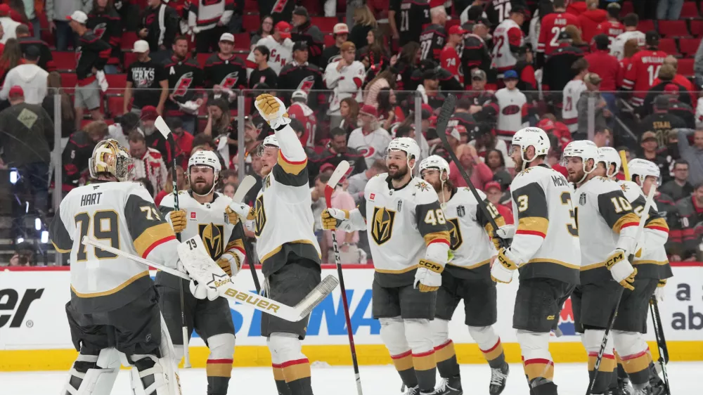 Jun 2, 2026; Raleigh, North Carolina, USA; Vegas Golden Knights celebrate the win against the Carolina Hurricanes in game one of the 2026 Stanley Cup Final at Lenovo Center. Mandatory Credit: James Guillory-Imagn Images