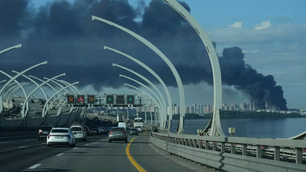 A plume of black smoke is seen over the port of St. Petersburg, Russia, Wednesday, June 3, 2026, after a Ukrainian drone attack. (AP Photo)