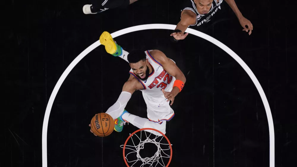 Jun 3, 2026; San Antonio, Texas, USA; New York Knicks center Karl-Anthony Towns (32) shoots the ball during game one of the 2026 NBA Finals at Frost Bank Center. Mandatory Credit: Eric Gay-Pool Photo via Imagn Images