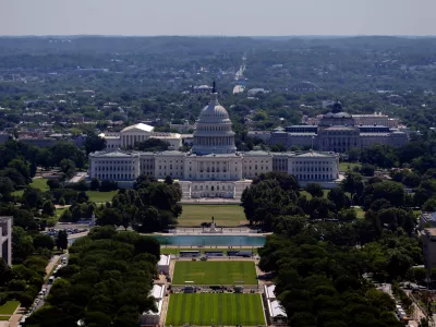 The U.S. Capitol and National Mall are seen as the set up for the America 250 celebration continues, Wednesday, June 3 2026, in Washington. (AP Photo/Rahmat Gul)