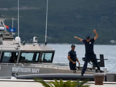 A Montenegrin navy sailor jumps from a boat after a patrol ahead of the EU-Western Balkans summit in Tivat, Montenegro, June 4, 2026. REUTERS/Stevo Vasiljevic