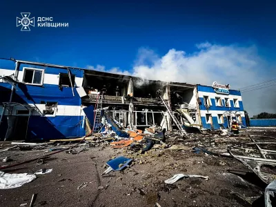 Rescuers work at a site of a dairy plant hit by a Russian drone strike, amid Russia's attack on Ukraine, in Kyiv region, Ukraine in this handout picture released June 5, 2026. Press service of the State Emergency Service of Ukraine in Kyiv region/Handout via REUTERS ATTENTION EDITORS - THIS IMAGE HAS BEEN SUPPLIED BY A THIRD PARTY. WATERMARK FROM SOURCE. MANDATORY CREDIT. BEST QUALITY AVAILABLE.