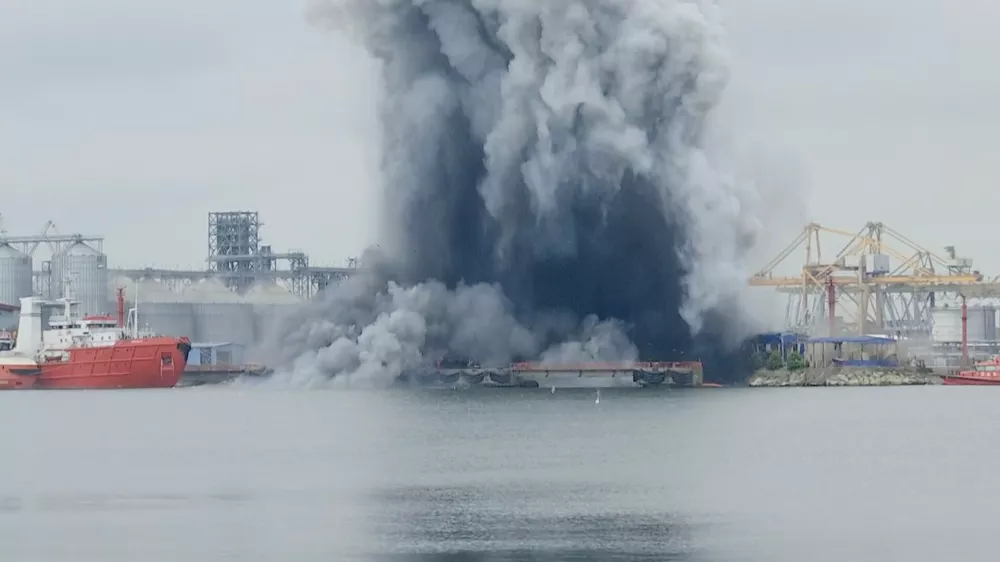 In this photo taken from video provided by OBSERVATOR ANTENA 1, an explosion of sea drone is seen in Constanta port, Romania, Friday, June 5, 2026. (OBSERVATOR ANTENA 1 via AP)