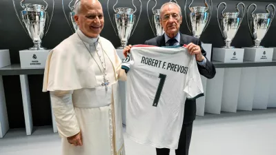 Pope Leo XIV meets with Real Madrid president Florentino Perez, during a meeting with the diocesan community at the Santiago Bernabeu Stadium, in Madrid, Spain, June 8, 2026. Elisabetta Trevisan/Vatican Media/­Handout via REUTERS ATTENTION EDITORS - THIS IMAGE WAS PROVIDED BY A THIRD PARTY.
