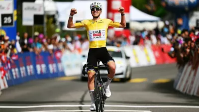 CHARMEY, SWITZERLAND - MAY 02: Tadej Pogacar of Slovenia and UAE Team Emirates - XRG - Yellow Leader Jersey celebrates at finish line as stage winner during the 79th Tour de Romandie 2026, Stage 4 a 149.6km stage from Broc to Charmey / #UCIWT / on May 02, 2026 in Charmey, Switzerland. (Photo by Dario Belingheri/Getty Images)
