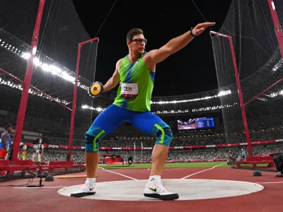 Tokyo 2020 Olympics - Athletics - Men's Discus Throw - Final - OLS - Olympic Stadium, Tokyo, Japan - July 31, 2021. Kristjan Ceh of Slovenia in action REUTERS/Dylan Martinez