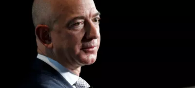 FILE PHOTO - Jeff Bezos, founder of Blue Origin and CEO of Amazon, speaks about the future plans of Blue Origin during an address to attendees at Access Intelligence's SATELLITE 2017 conference in Washington, DC, U.S. on March 7, 2017. REUTERS/Joshua Roberts/File Photo