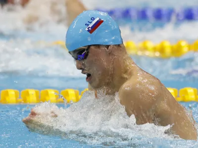 Slovenia's Peter John Stevens competes in a men's 50-meter breaststroke semifinal during the European Swimming Championships at the London Aquatics Centre in London, Friday, May 20, 2016. (AP Photo/Matt Dunham)